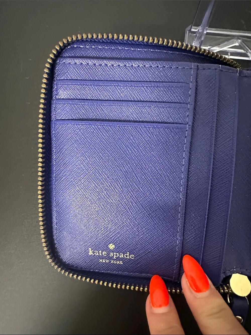 EUC kate spade cobalt blue laser-cut zip wallet with gold logo and Gold Zipper